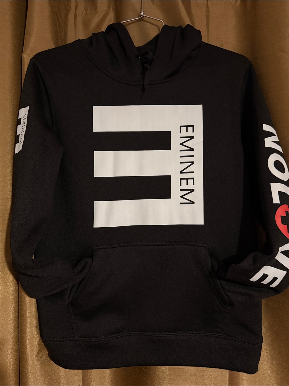 Eminem "Recovery" album pullover hoodie featuring the rapper's signature logo.